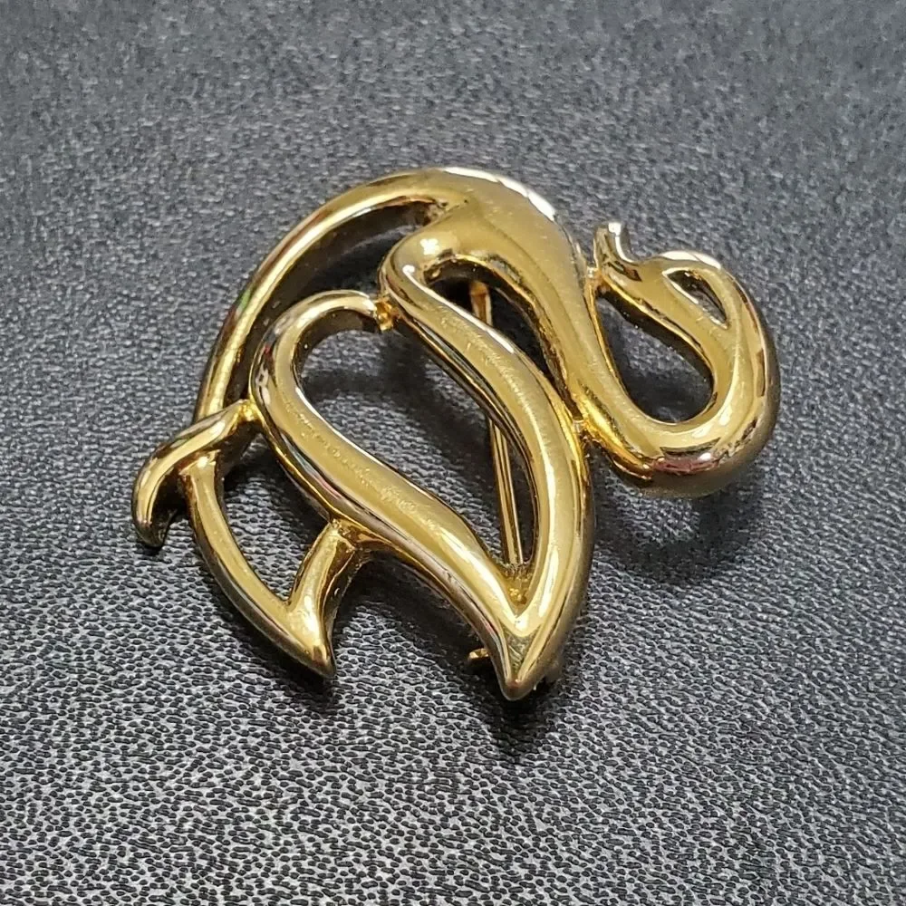 Crown Trifari gold tone swan brooch